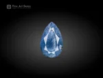 34.15 carat pear cut dumortierite included quartz gemstone from Bahia, Brazil, with blue needle inclusions