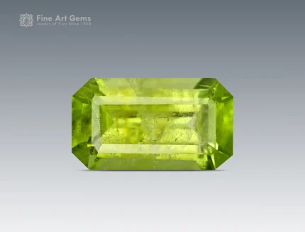 Emerald cut peridot gemstone with bright apple green color from Pakistan