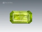 Emerald cut peridot gemstone with bright apple green color from Pakistan