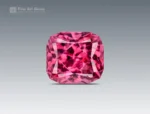 0.80 carat cushion cut rhodolite garnet from Africa with a hot pink color
