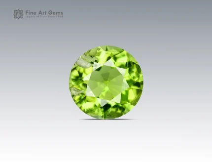 0.90 carat round cut peridot from Pakistan with medium green color