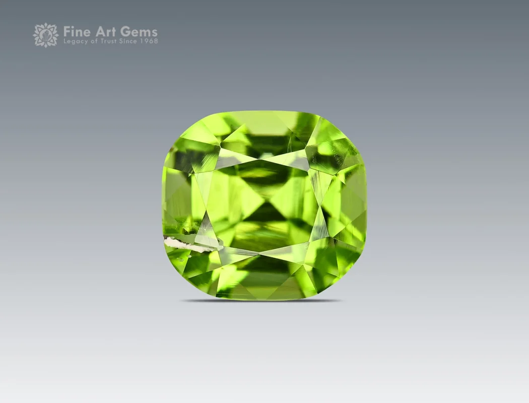 Natural apple green cushion cut peridot gemstone from Pakistan, weighing 1.30 carats