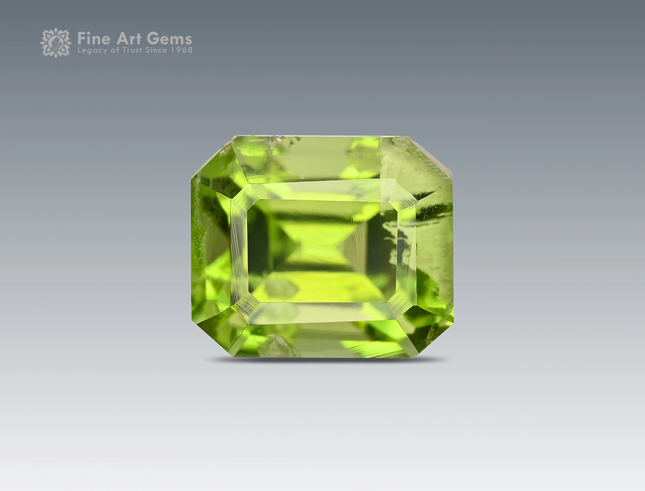 1.30 Carat Emerald Cut Peridot - Pakistan (2) Apple green 1.30 carat emerald-cut Peridot gemstone from Pakistan