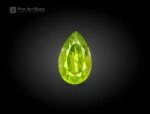 Natural pear-cut green peridot from Pakistan with vibrant color and lively brilliance.