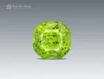 4.35 carat cushion-cut apple green Peridot with Ludwigite inclusions from Pakistan