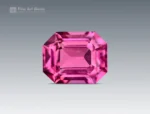 0.75 carat emerald cut rhodolite garnet from Africa with raspberry pink color