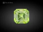 Emerald cut apple green peridot gemstone from Pakistan, 0.80 carat, untreated