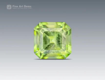 Emerald cut apple green peridot gemstone from Pakistan, 0.80 carat, untreated