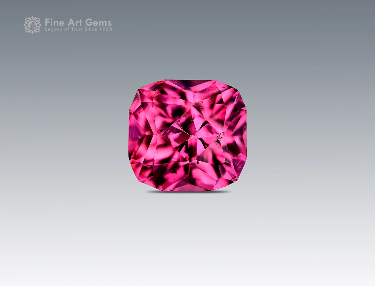0.90 Carat Cushion Cut Rhodolite Garnet (2) 0.90 carat cushion cut rhodolite garnet from Africa with raspberry pink color