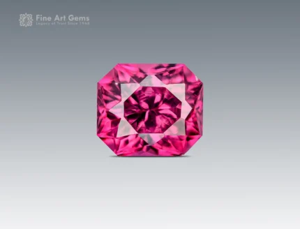 Natural 1 carat cushion cut rhodolite garnet with vivid raspberry pink color, eye-clean clarity, and excellent brilliance from Africa.