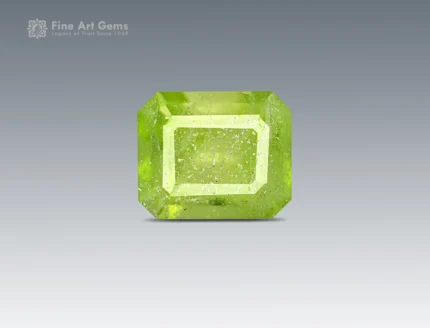 Natural 1.70 carat emerald-cut peridot gemstone with vibrant lime-green color and natural inclusions from Pakistan.
