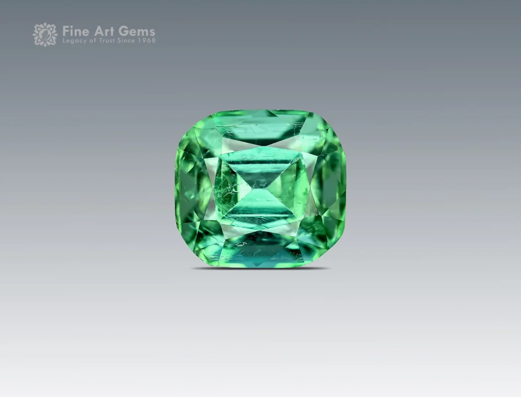Natural 2.10 carat cushion cut green tourmaline from Afghanistan with vibrant green color and excellent brilliance.