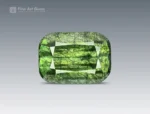7 carat cushion cut green peridot with ludwigite inclusions from Pakistan