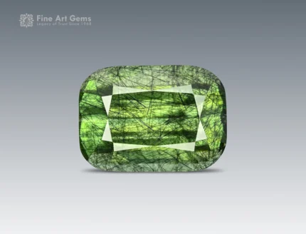 7 carat cushion cut green peridot with ludwigite inclusions from Pakistan